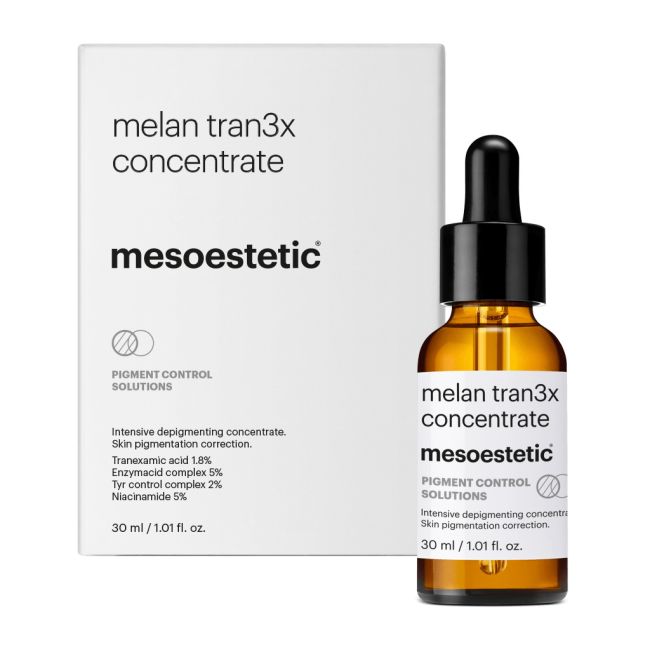 melan tran3x concentrate של mesoestetic - בקבוק הסרום לצד אריזת המוצר