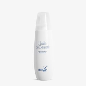 Huile de Beauté - שמן גוף להזנה ולריכוך העור; בקבוק לבן של שמן היופי עם מכסה שקוף על רקע בהיר