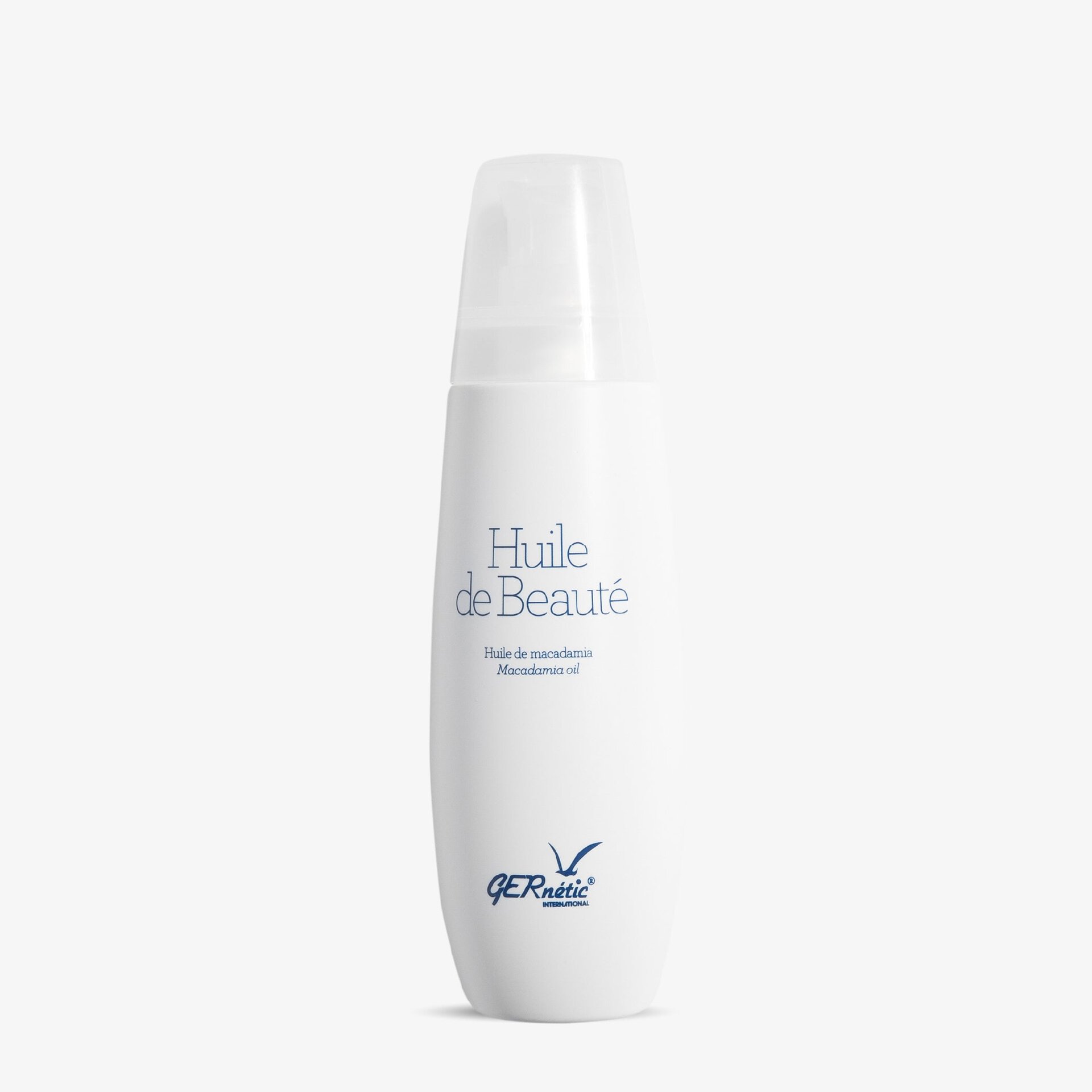 Huile de Beauté - שמן גוף להזנה ולריכוך העור; בקבוק לבן של שמן היופי עם מכסה שקוף על רקע בהיר