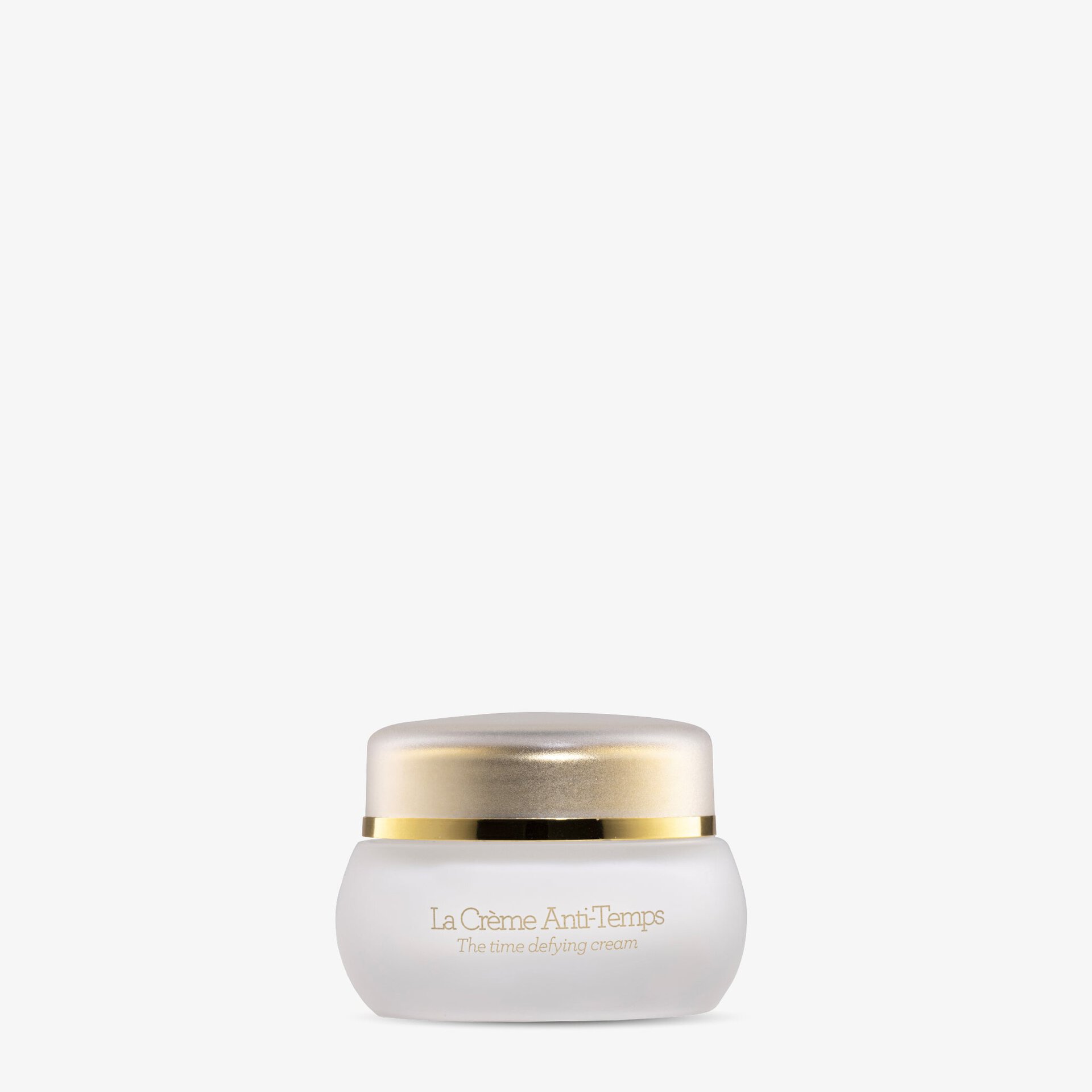 Crème Anti-Temps של GERnétic - צנצנת קרם חלבית עם מכסה מוזהב על רקע בהיר