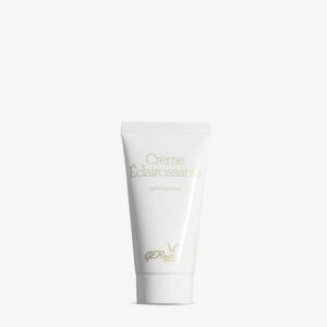 Crème Éclaircissante של GERnétic - שפופרת קרם ההבהרה הלבנה על רקע בהיר