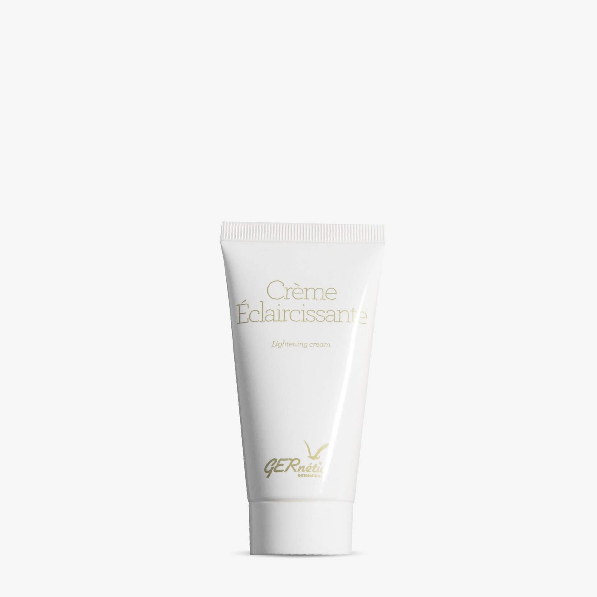 Crème Éclaircissante של GERnétic - שפופרת קרם ההבהרה הלבנה על רקע בהיר